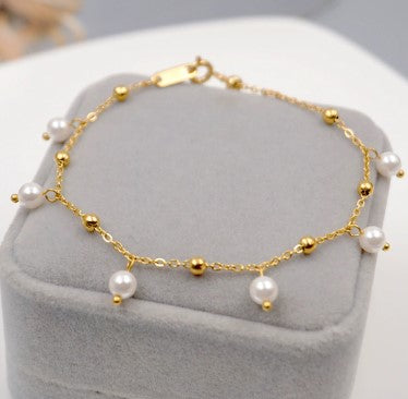 Pulsera de perlas a la deriva