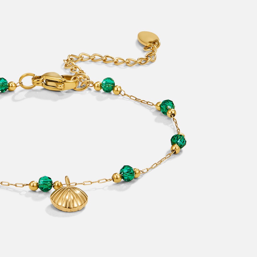 Pulsera Nerissa con Concha Dorada y Cuentas Verdes