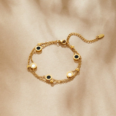 Pulsera de ónix y piedra blanca